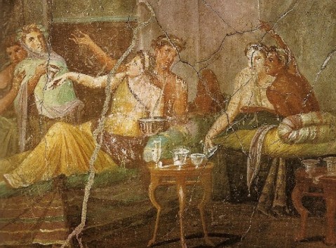 In questo affresco pompeiano un tipico banchetto in una villa dell'antica Roma 