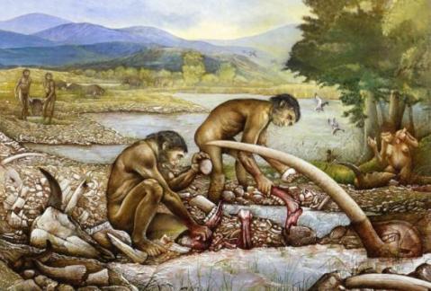 Ricostruzione di un pasto con carcasse di animali dell'uomo preistorico cacciatore-raccoglitore