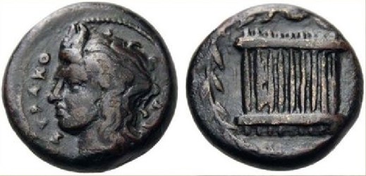 Una rara rappresentazione di una siringa sul rovescio di un hemilitron di bronzo di Siracusa (344-317 a.C.)