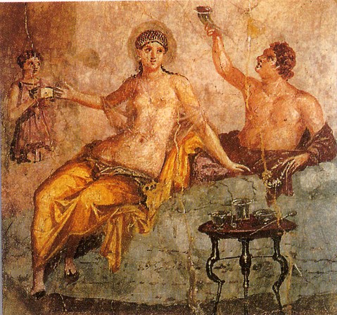 Nell'affresco una tipica scena di un banchetto all'epoca di Roma antica